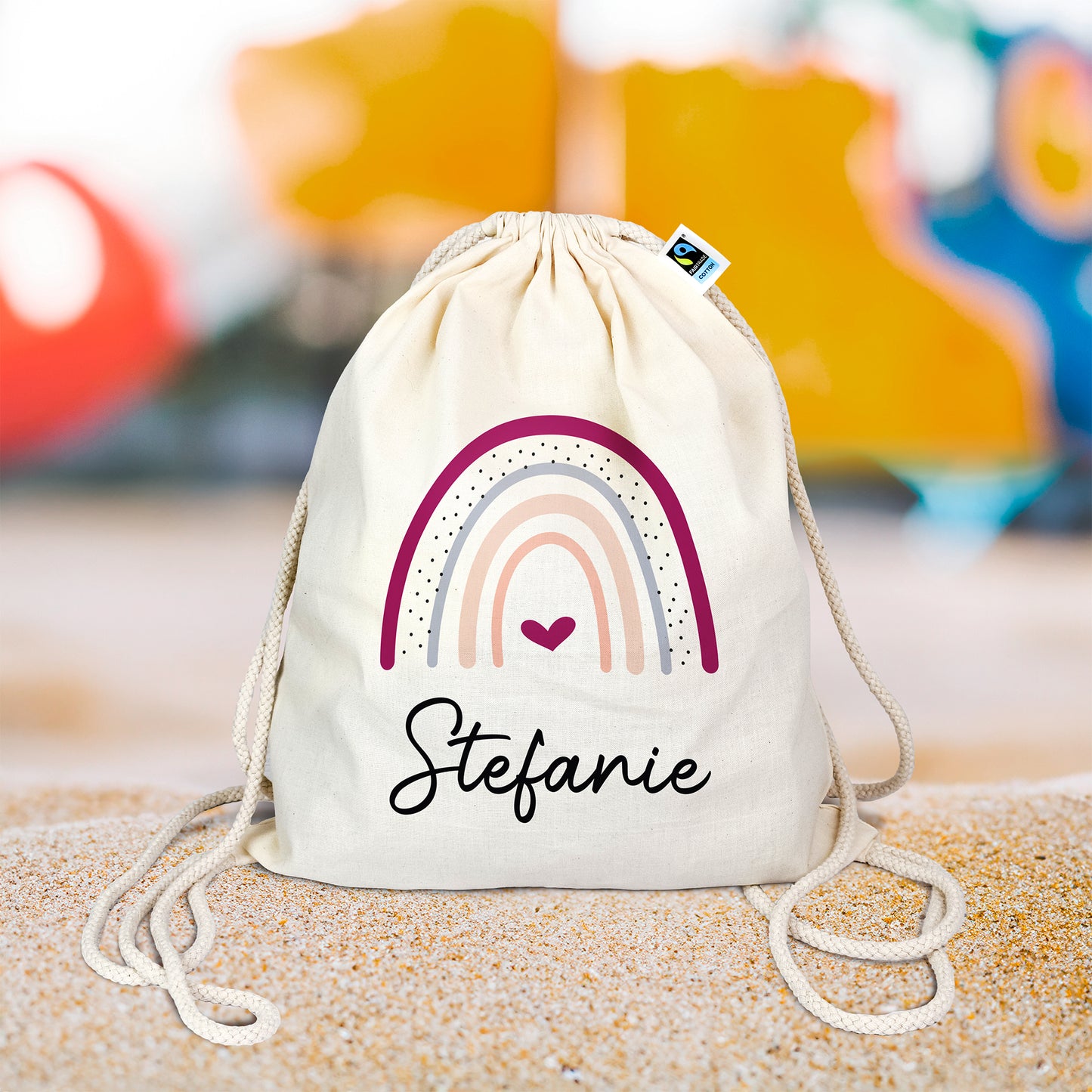 Turnbeutel aus Bio- Baumwolle mit Name | Regenbogen Herz