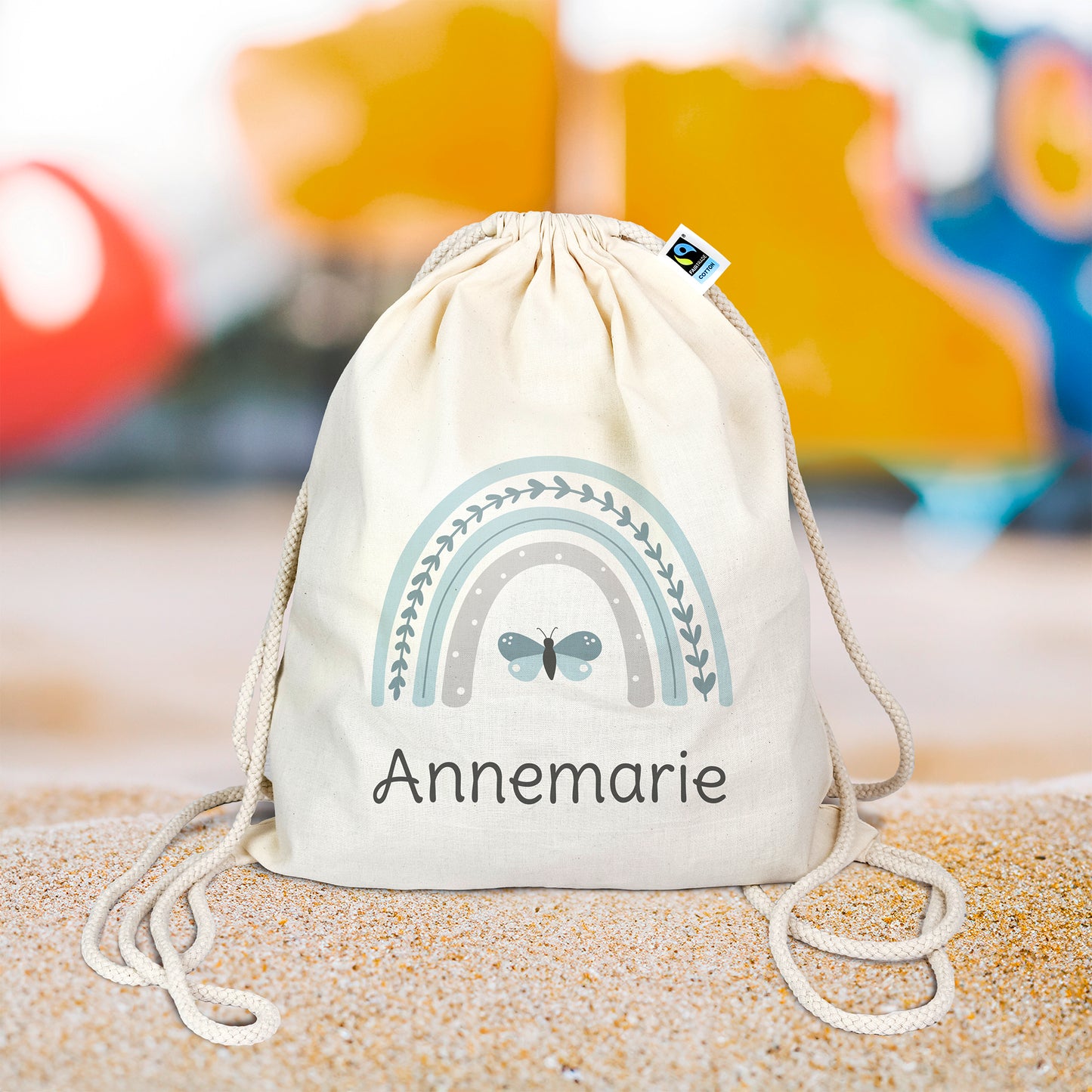Turnbeutel aus Bio- Baumwolle mit Name | Regenbogen mint + Schmetterling