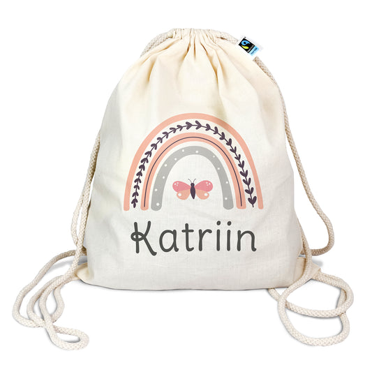 Turnbeutel aus Bio- Baumwolle mit Name | Regenbogen rosa + Schmetterling
