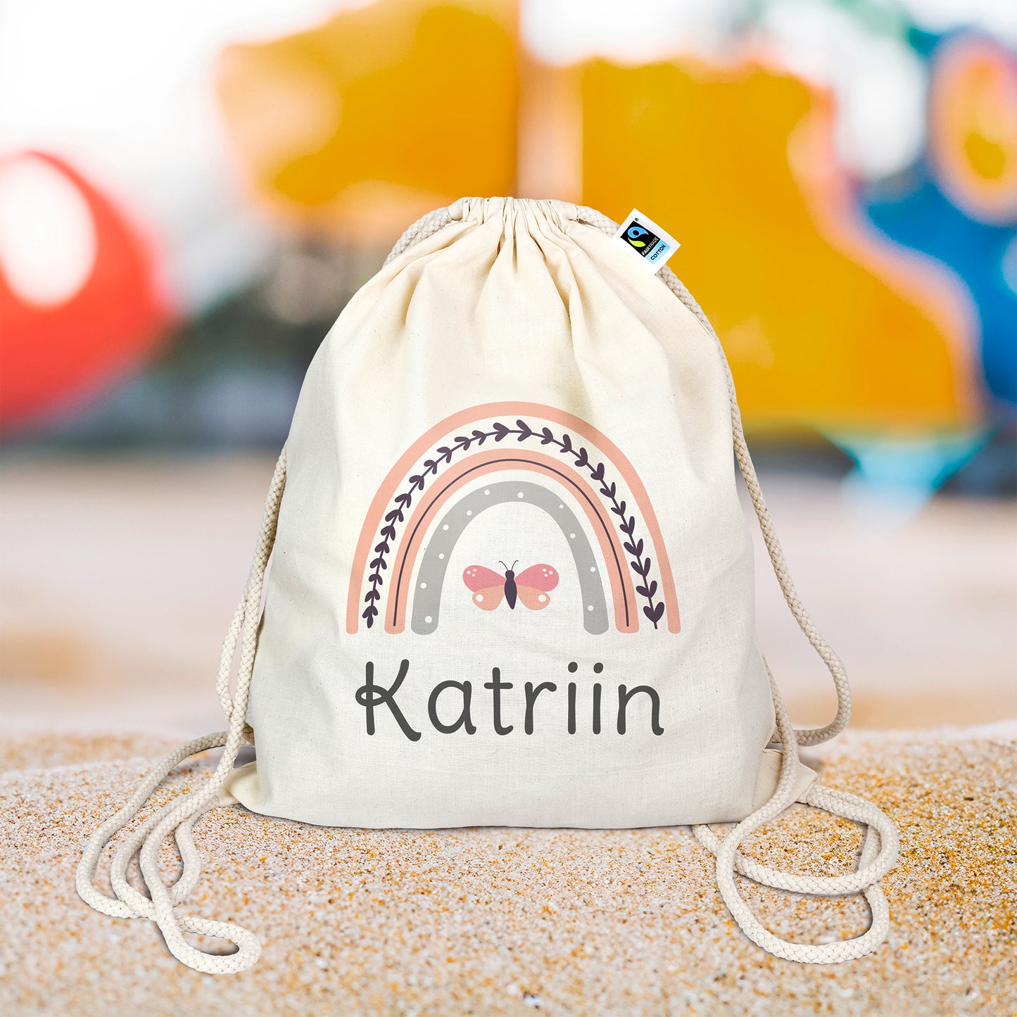 Turnbeutel aus Bio- Baumwolle mit Name | Regenbogen rosa + Schmetterling
