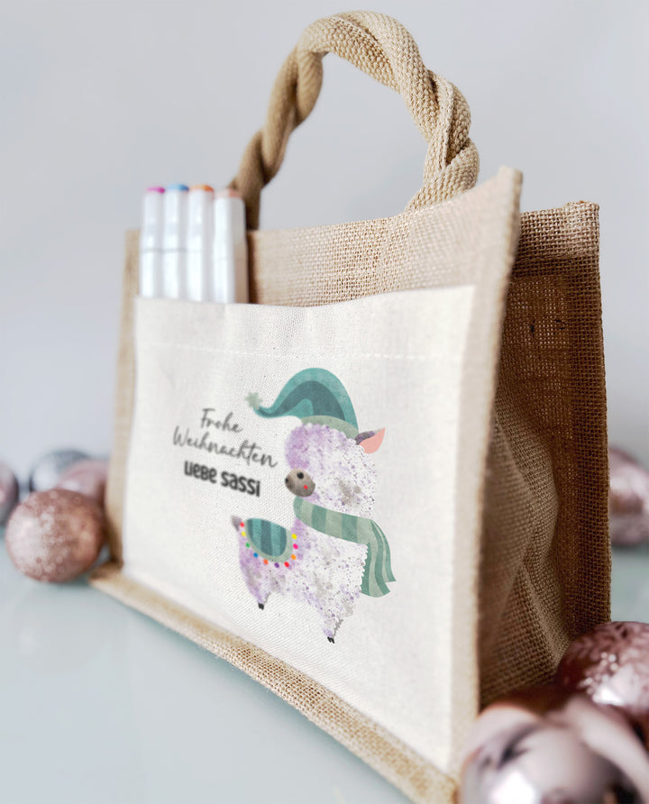 Personalisierte Jute Pocket Tasche | mit Wunschnamen | Frohe Weihnachten | Alpaka blau | Geschenktasche für Weihnachten