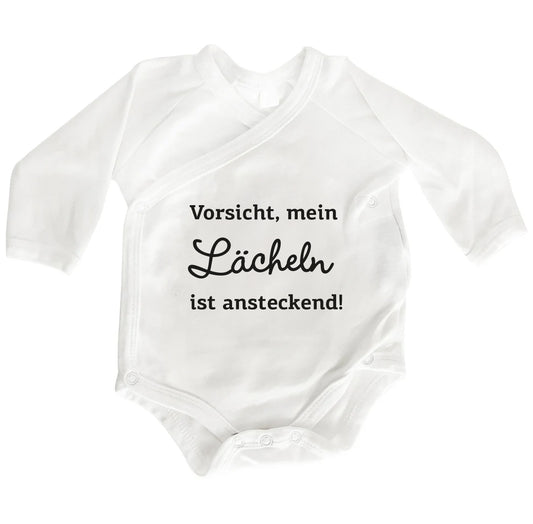 Baby Wickelbody aus Bio-Baumwolle | Vorsicht, mein Lächeln ist ansteckend | Langarm Baby Body | Perfektes Geschenk zur Geburt | süßer Spruch - verschenkich.de