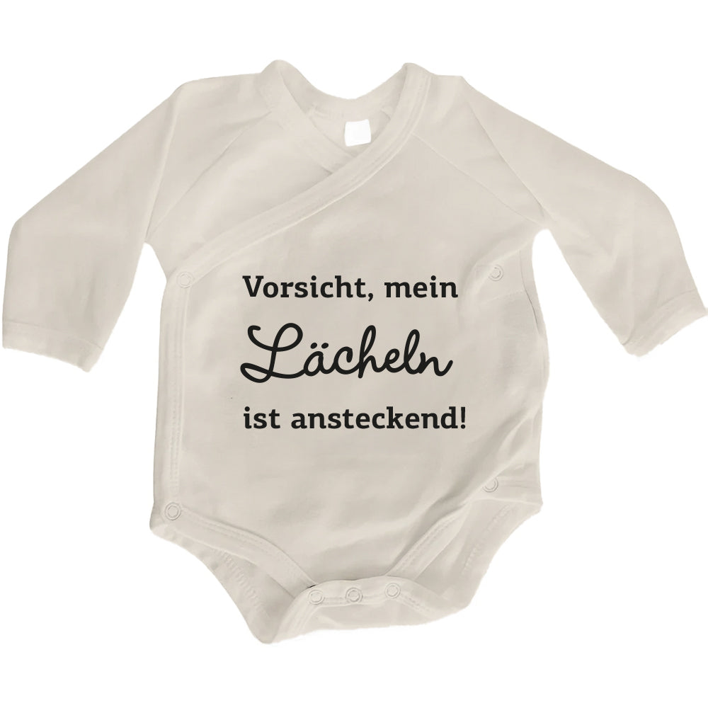Baby Body Langarm mit Spruch | Wickelbody aus Bio-Baumwolle | Vorsicht, mein Lächeln ist ansteckend