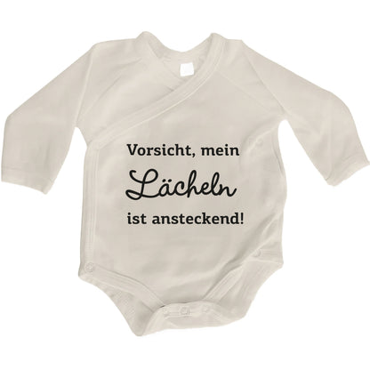 Baby Body Langarm mit Spruch | Wickelbody aus Bio-Baumwolle | Vorsicht, mein Lächeln ist ansteckend