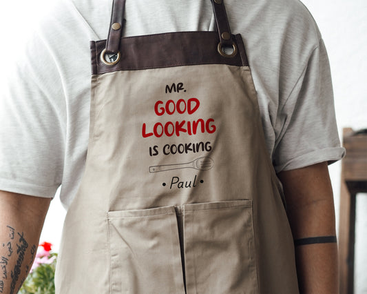Kochschürze mit Name | Mr. Good Looking is Cooking | schwarz oder beige - verschenkich.de