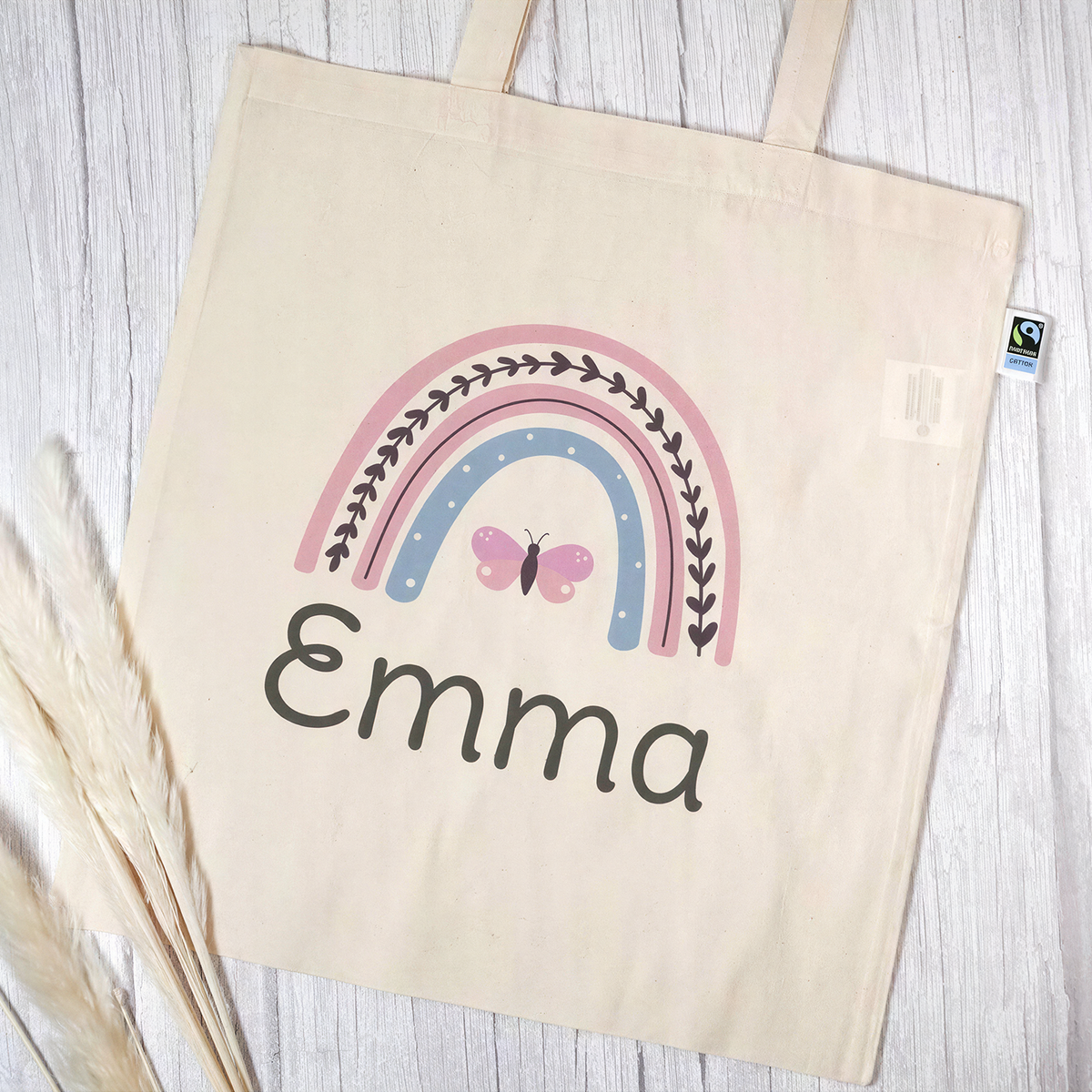Stofftasche aus Bio- Baumwolle mit Name | Regenbogen rosa + Schmetterling