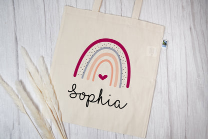 Stofftasche aus Bio- Baumwolle mit Name | Regenbogen Herz